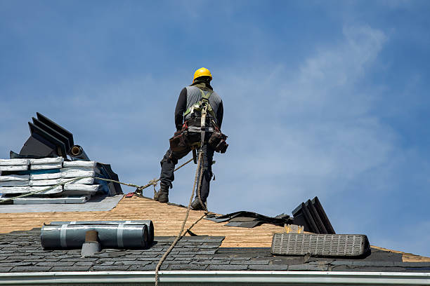 Professional Roofing technician working in Revloc, PA